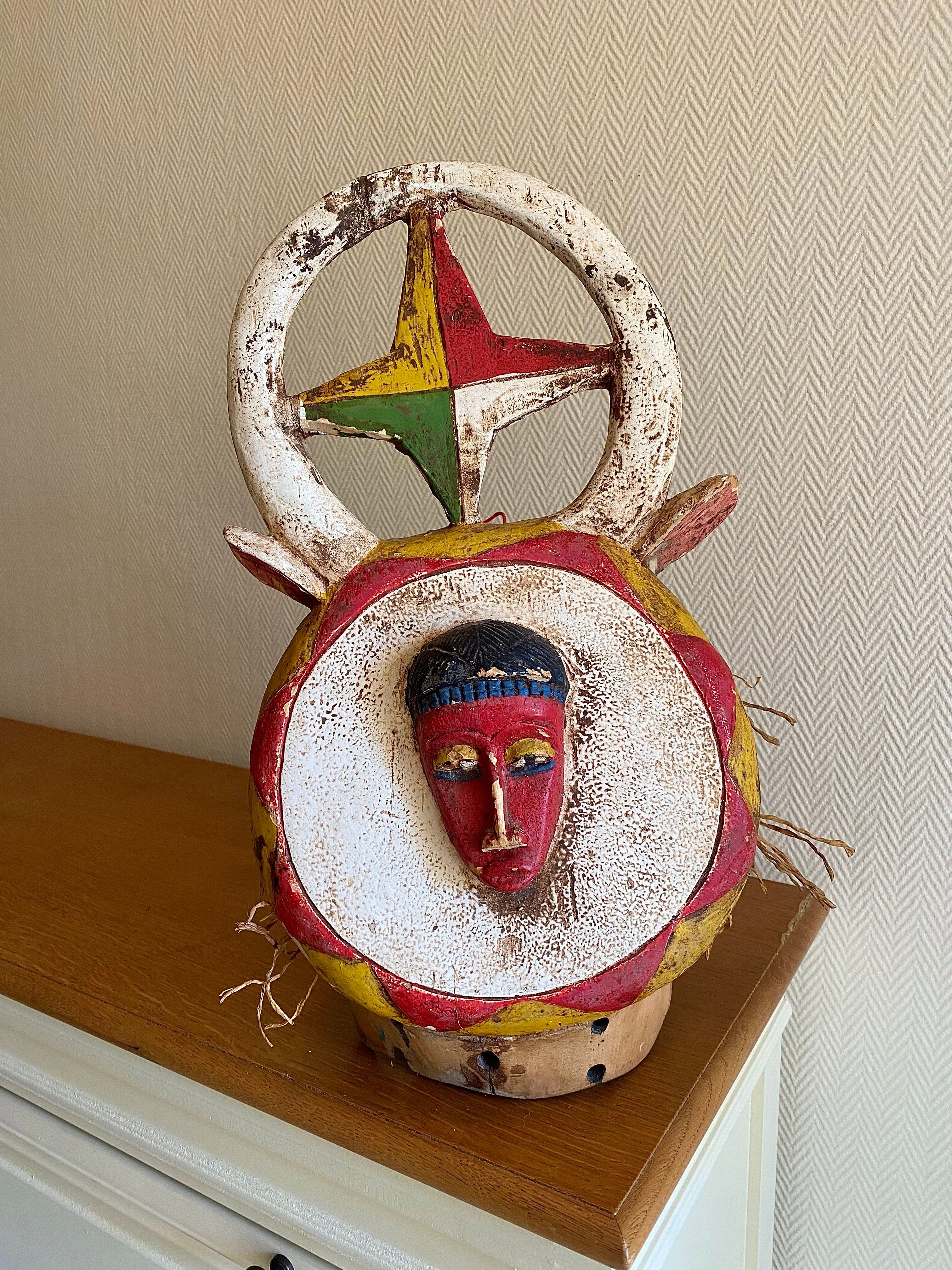 Polychrome carved wooden African mask