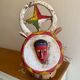 Polychrome carved wooden African mask