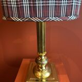 Lamp base in gilded brass, oval silk lampshade with a checkered pattern in burgundy.