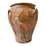 Ancient terracotta pottery jar