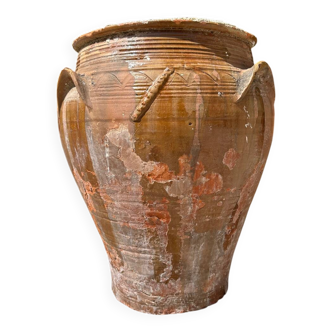 Ancient terracotta pottery jar