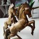 of greenhouse art deco bookends recancing unicorns. solid brass