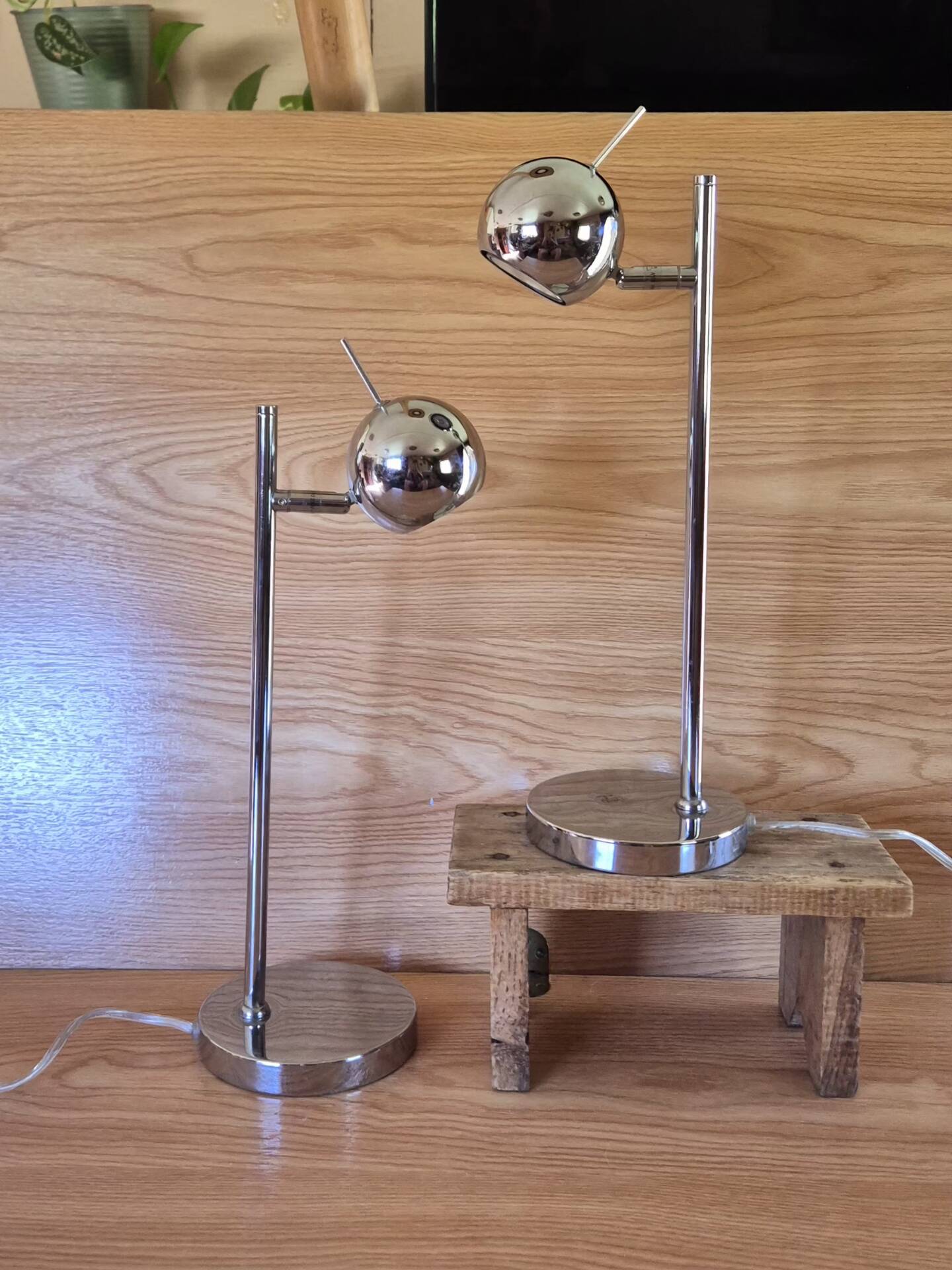 Set of 2 vintage 1970s chrome steel eye ball lamps.