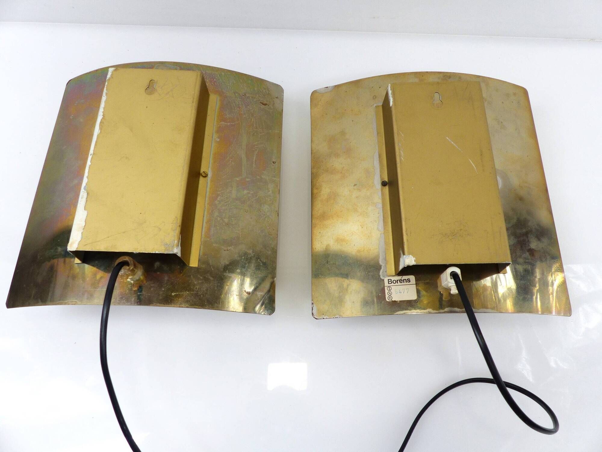 Pair of brutalist wall lights Boréns model 6477 in perforated brass – Sweden