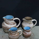 Lot of 4 ceramics assorted pitchers and vase