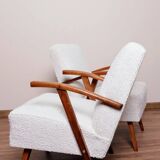 Vintage armchair in pearl bouclé, mid-century modern design from the 1960s.