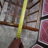 Old small bed or cradle for baby in vintage rattan