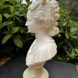 Alabaster bust of a woman signed Arnaldo Giannelli dated 1980.