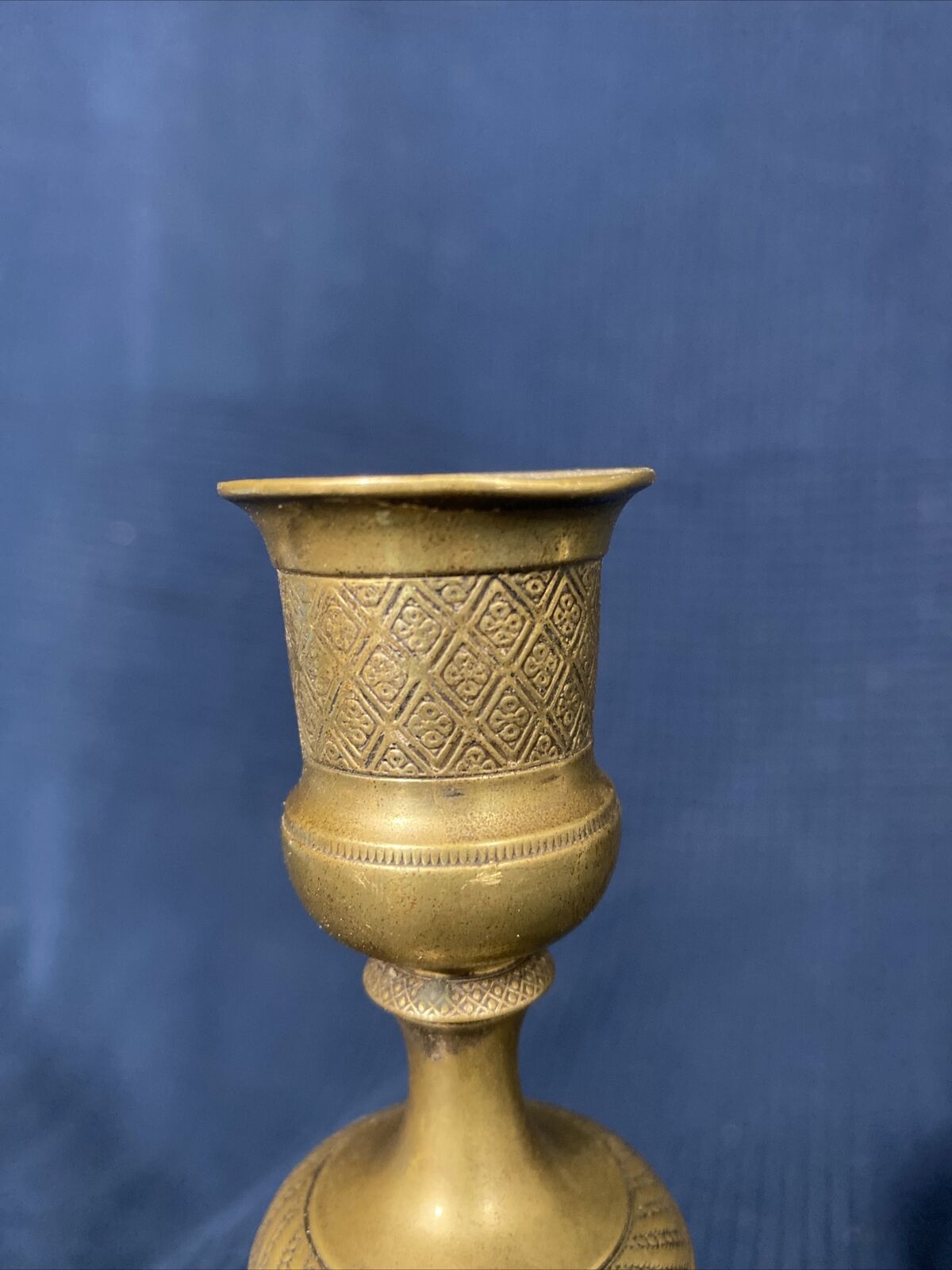 Old Louis-style brass candlestick
