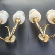 Pair of vintage wall sconces in gilded brass and pink opaline glass.