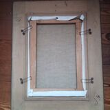 Tableau from the 20th century signed, depicting a woman with a bouquet.