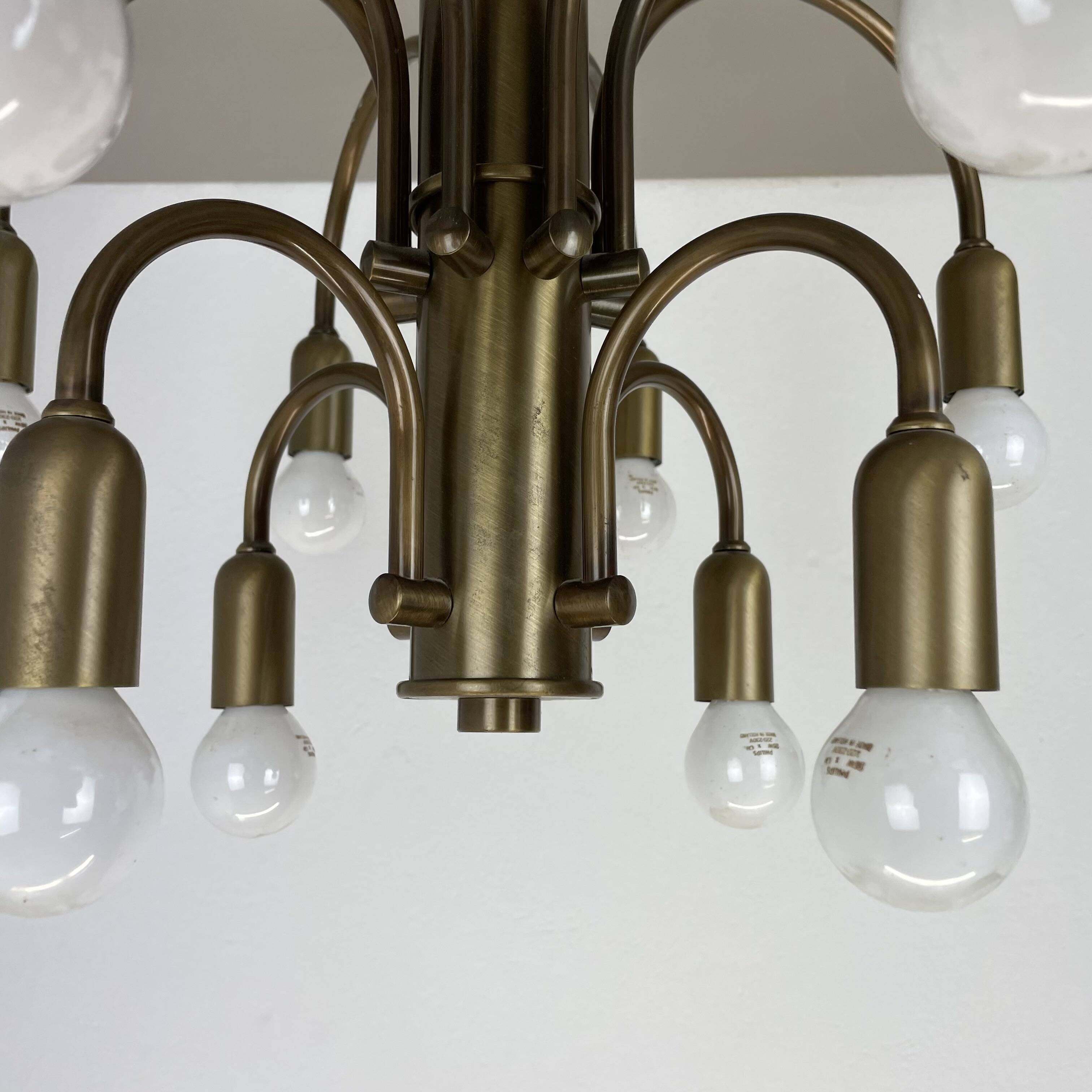 large 12-armed solid Brass ceiling light Chandelier by WKR Lights, Germany 1970s