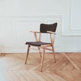 Renovated vintage armchair, bridge from the 1950s.