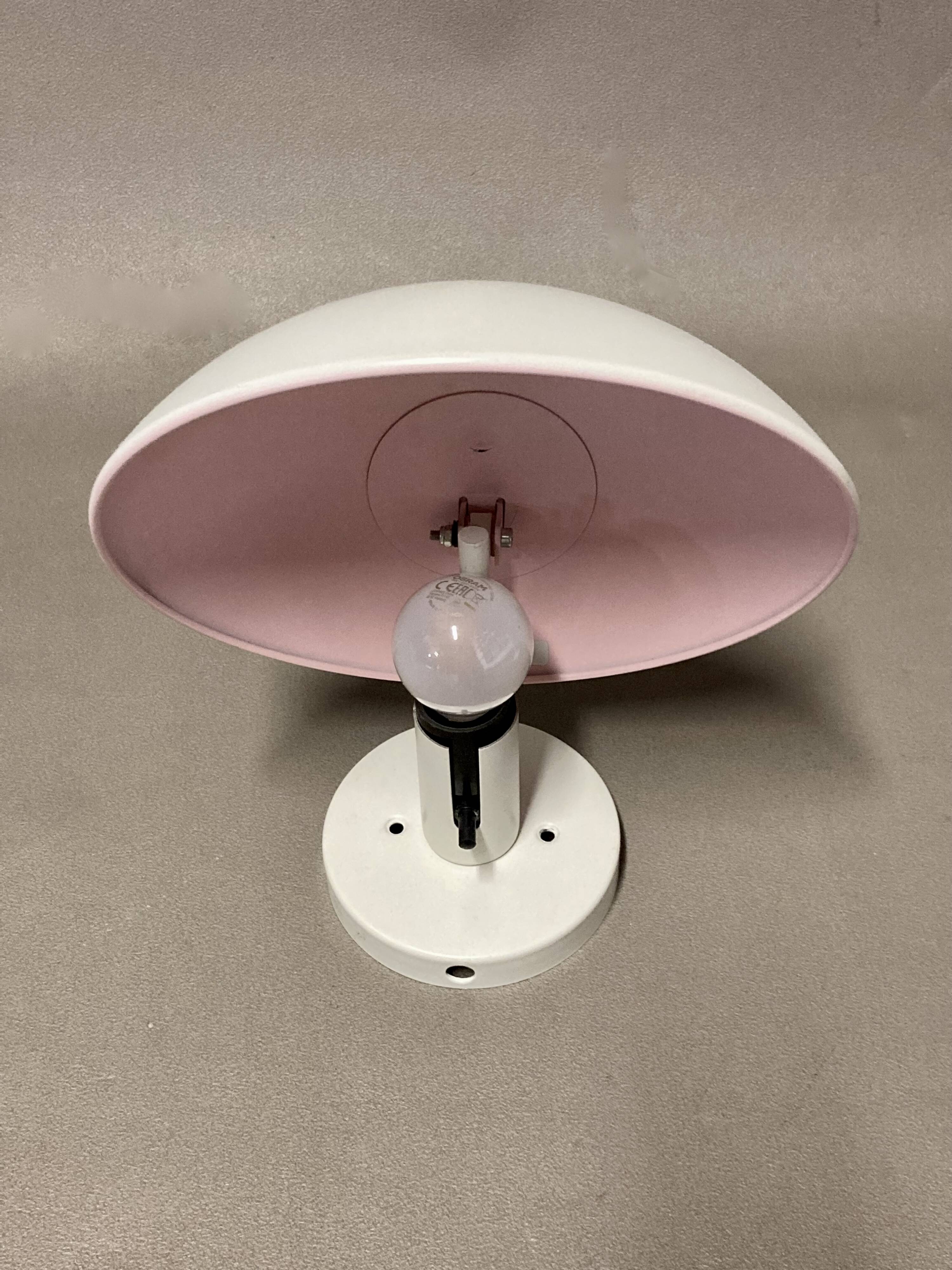 Pair of modular “Louis Poulsen Design” wall lights.