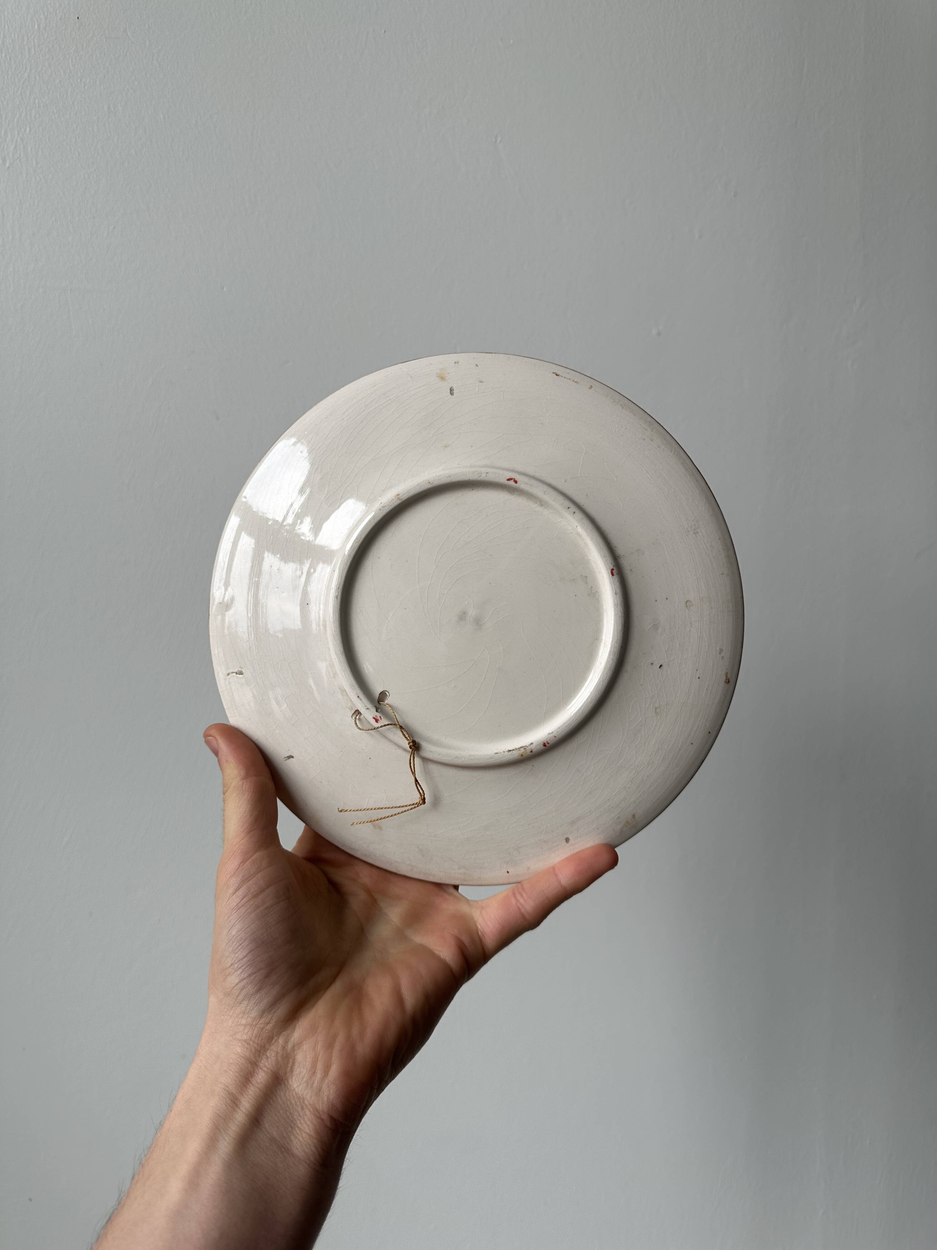 Old hand-painted plate