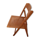 Folding chair in cannage