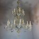 Venetian chandelier in gilded Murano glass, 24 light sources, three tiers, circa 1940.