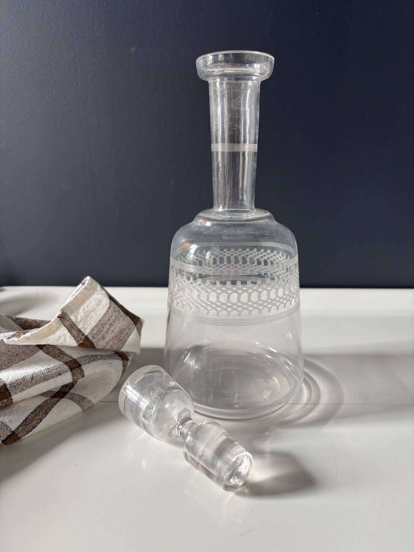 Antique engraved glass carafe with its stopper