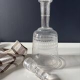 Antique engraved glass carafe with its stopper