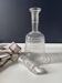 Antique engraved glass carafe with its stopper