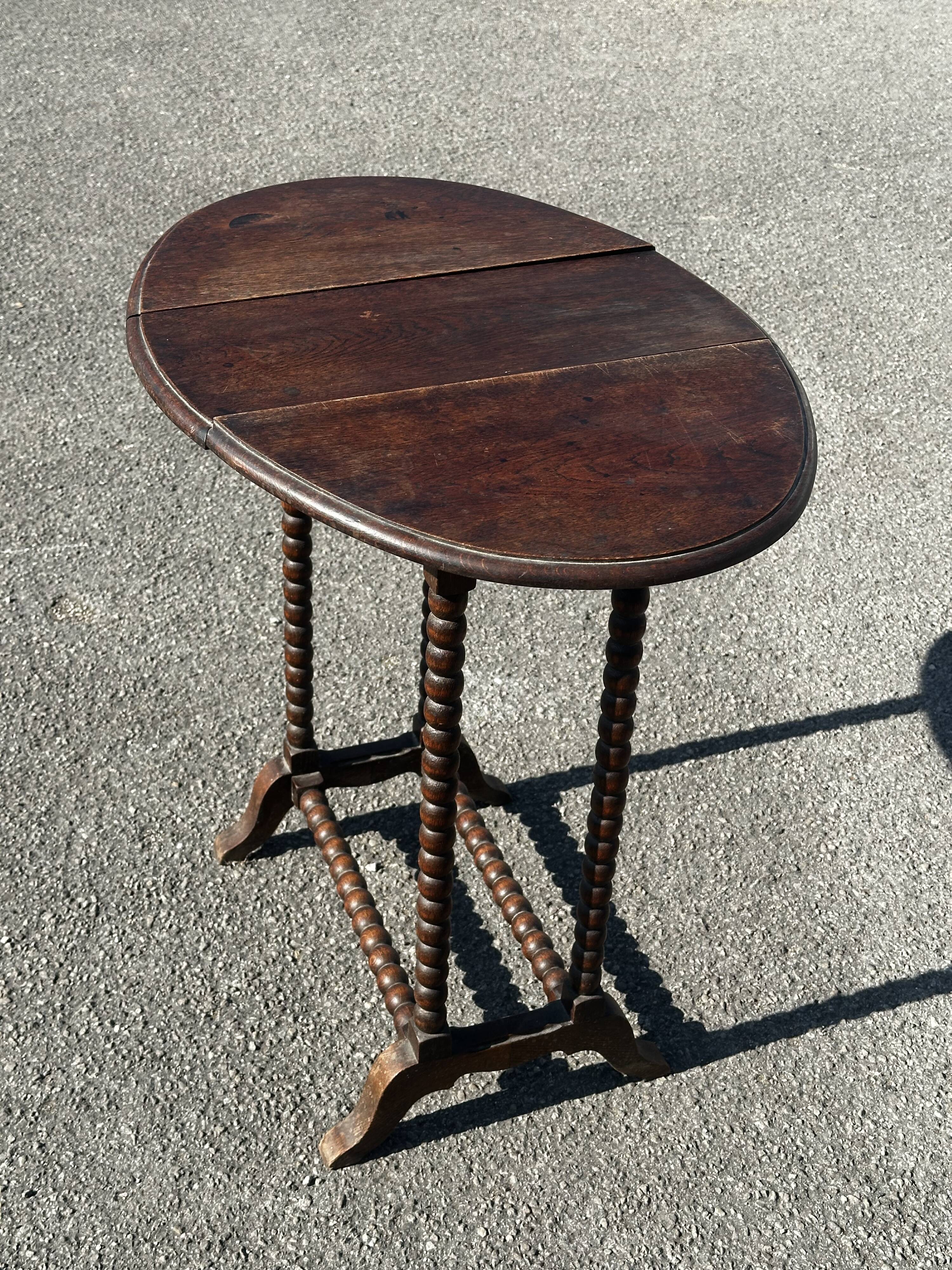 Small folding table called Gateleg, Victorian era
