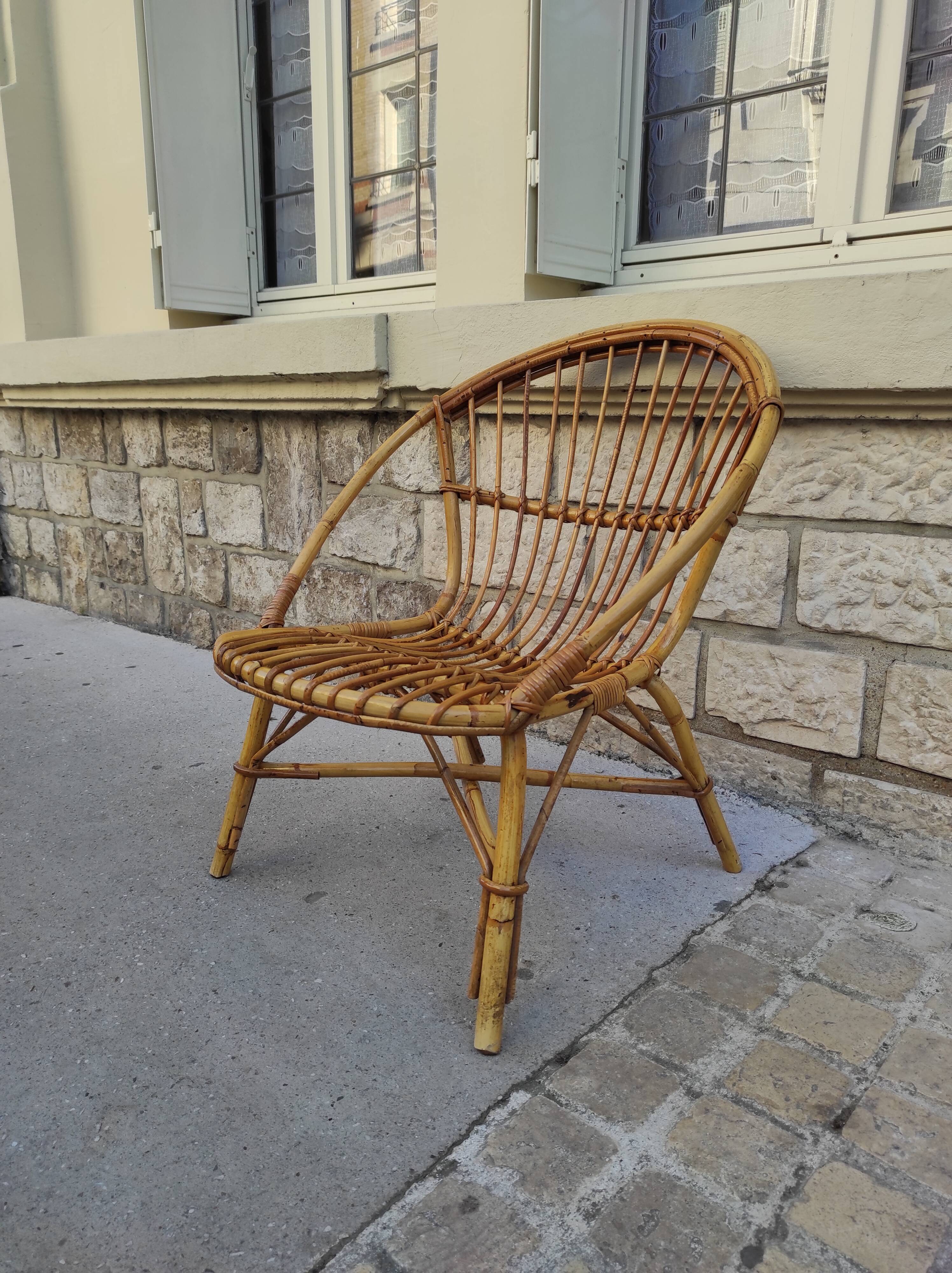 Large rattan armchair