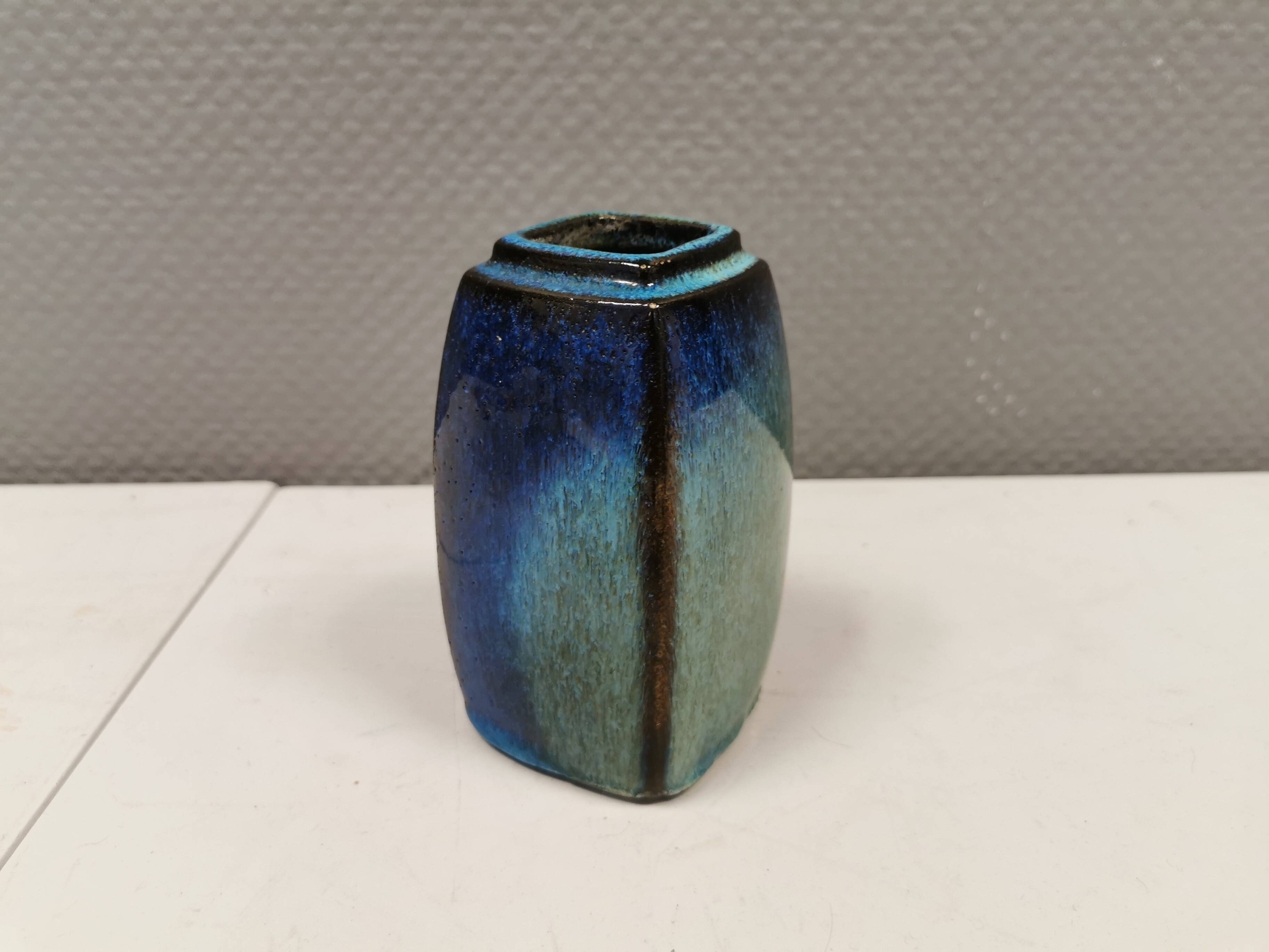 Vase in several shades of blue, from Danish Stogo art pottery. Estimated 1970-1980s