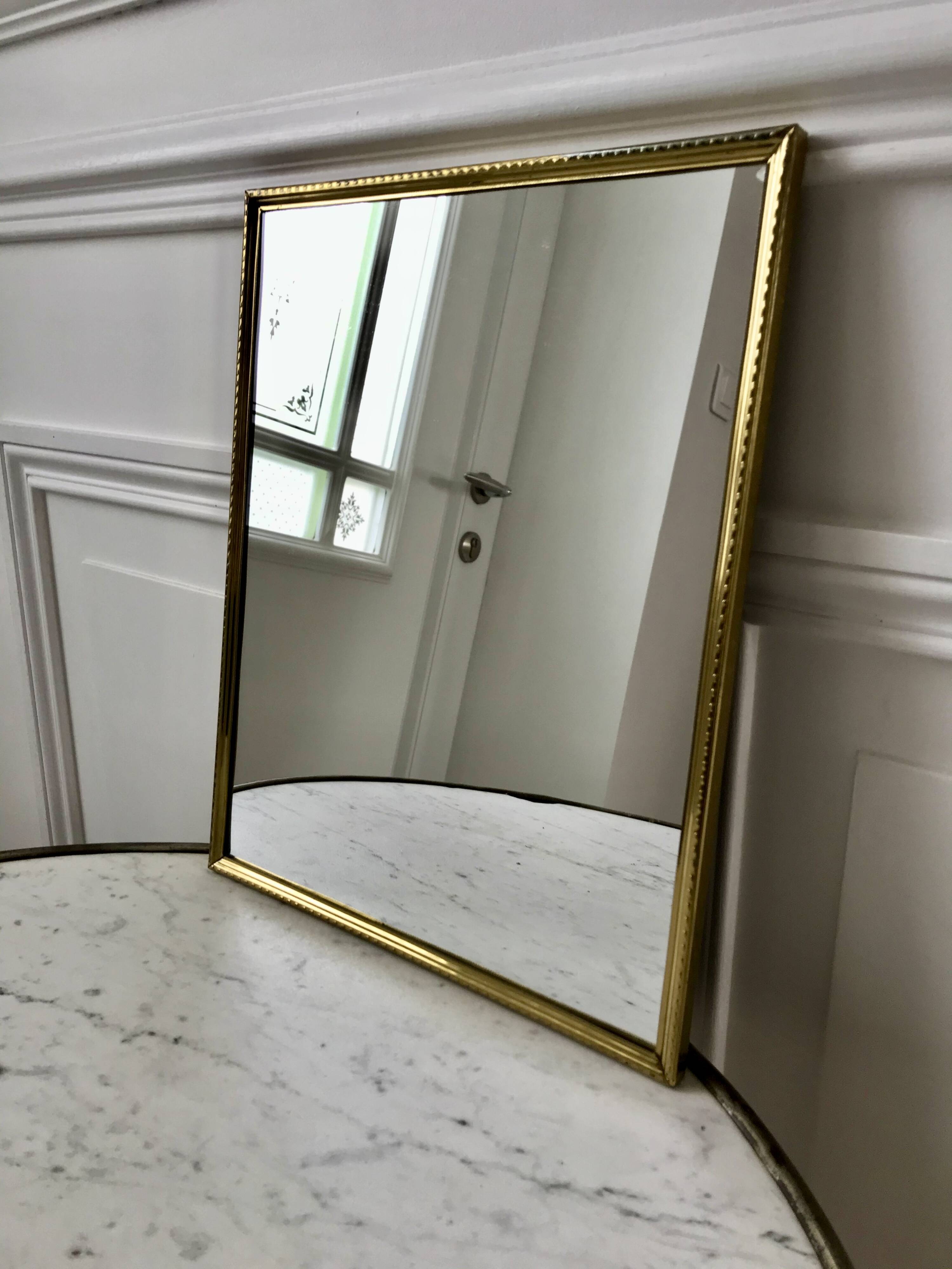 Gilded brass mirror from the 40s and 50s