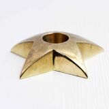 Star-shaped brass candle holder
