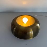Flush-mounted disc-shaped brass fixture from the mid-century, 1960, Italy.