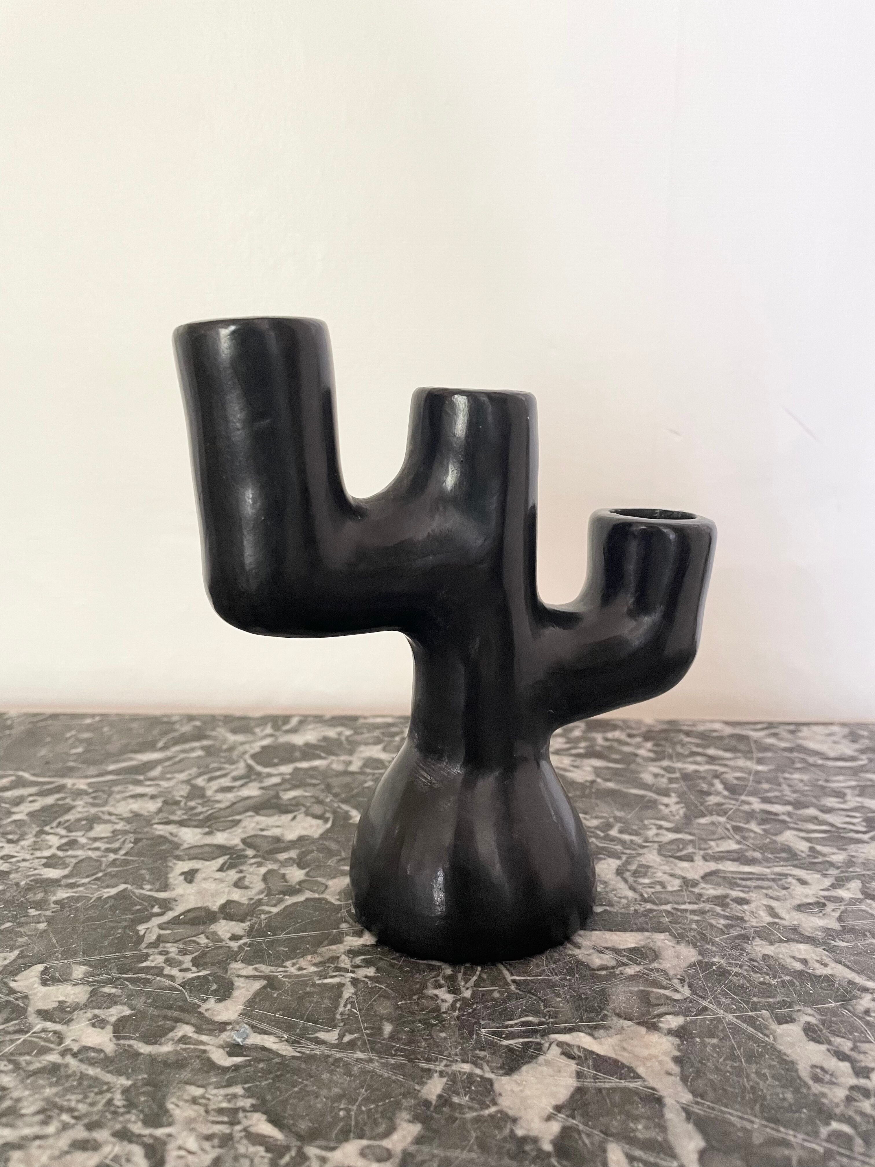 Black clay candle holder