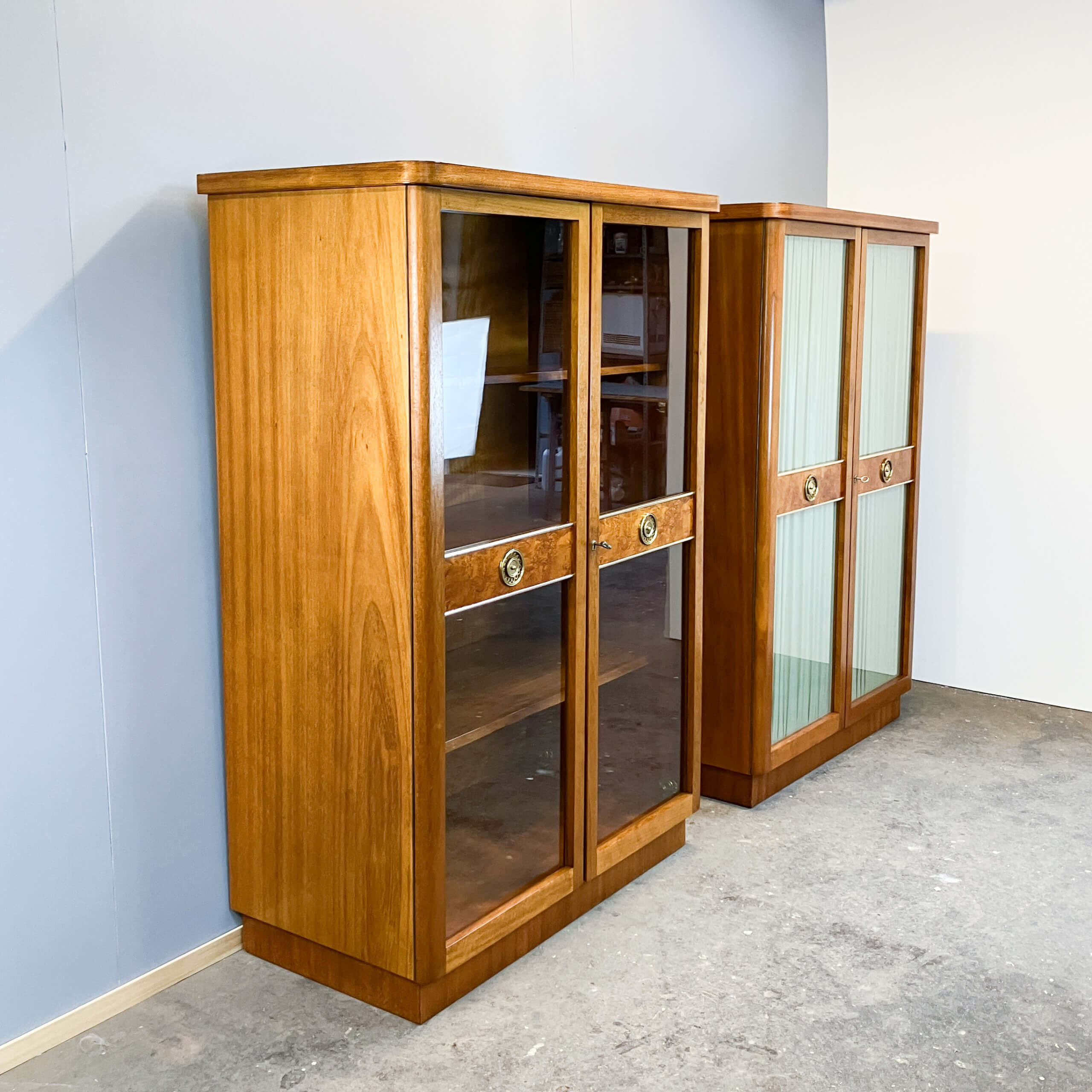 Art Deco cabinet with glass doors, various woods, 1930s