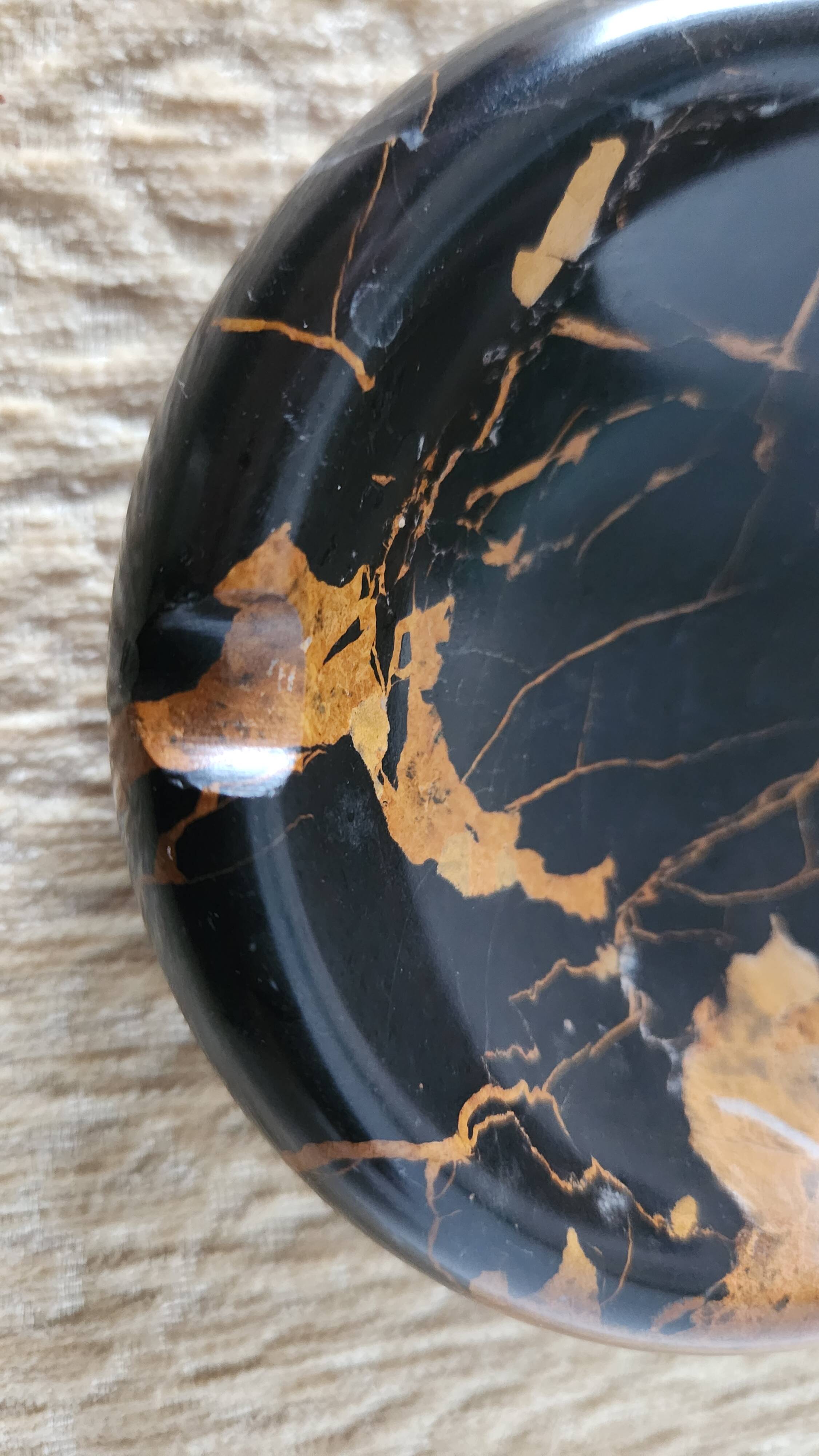 Vintage round ashtray in Italian black and gold Portoro marble.