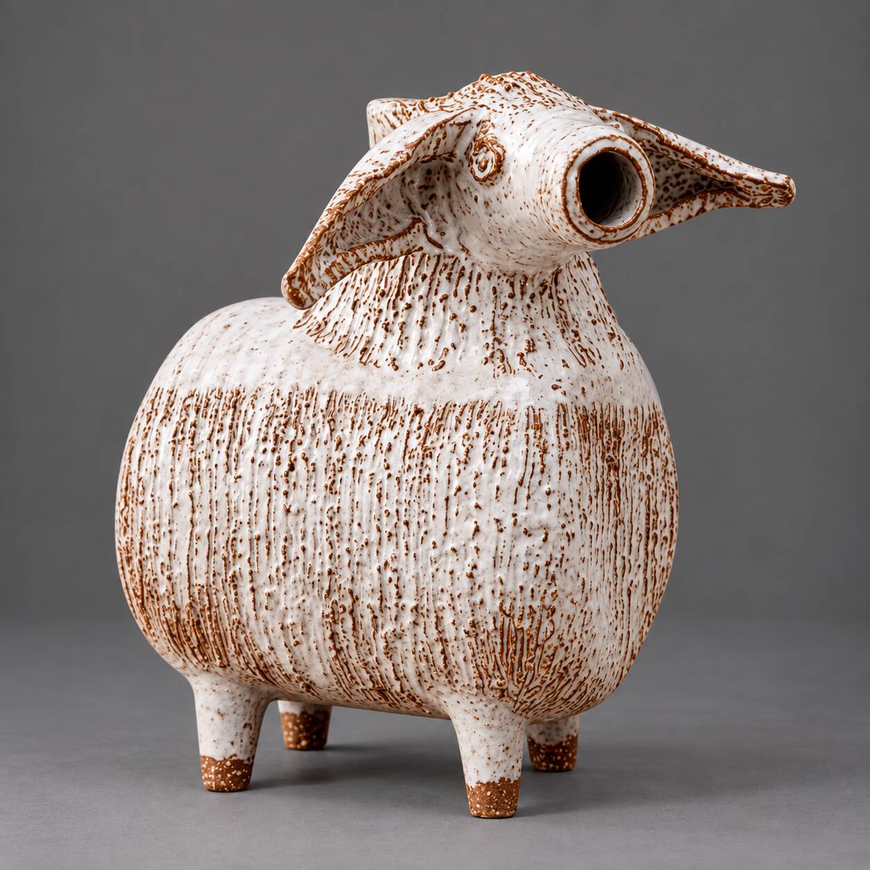 Ceramic sheep figure, sponge-glazed stoneware, Scandinavian mid-century.