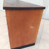 Workshop furniture with drawers and curtain in beech and walnut.