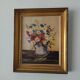 Vintage still life of a country bouquet signed J Dubois with a golden frame.