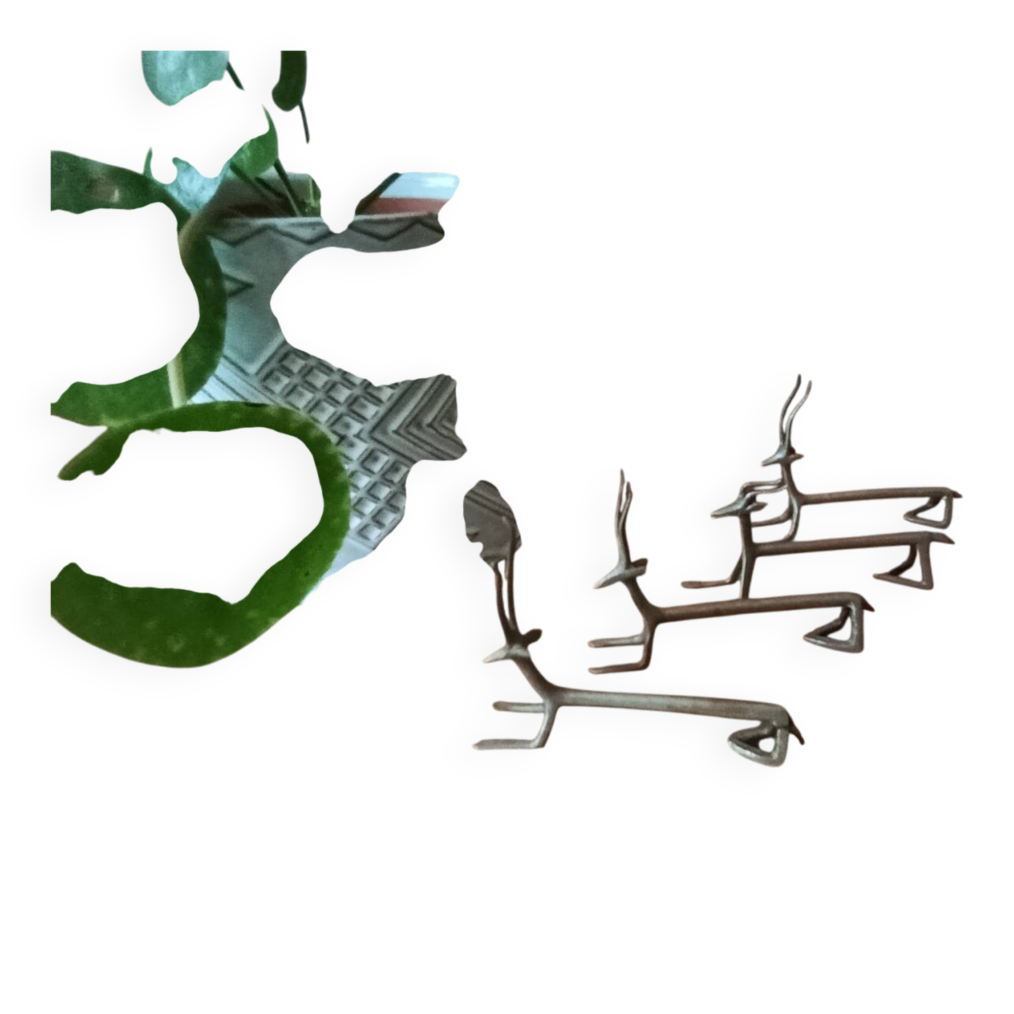 4 antique artisanal African zoomorphic knife holders from the 1970s.