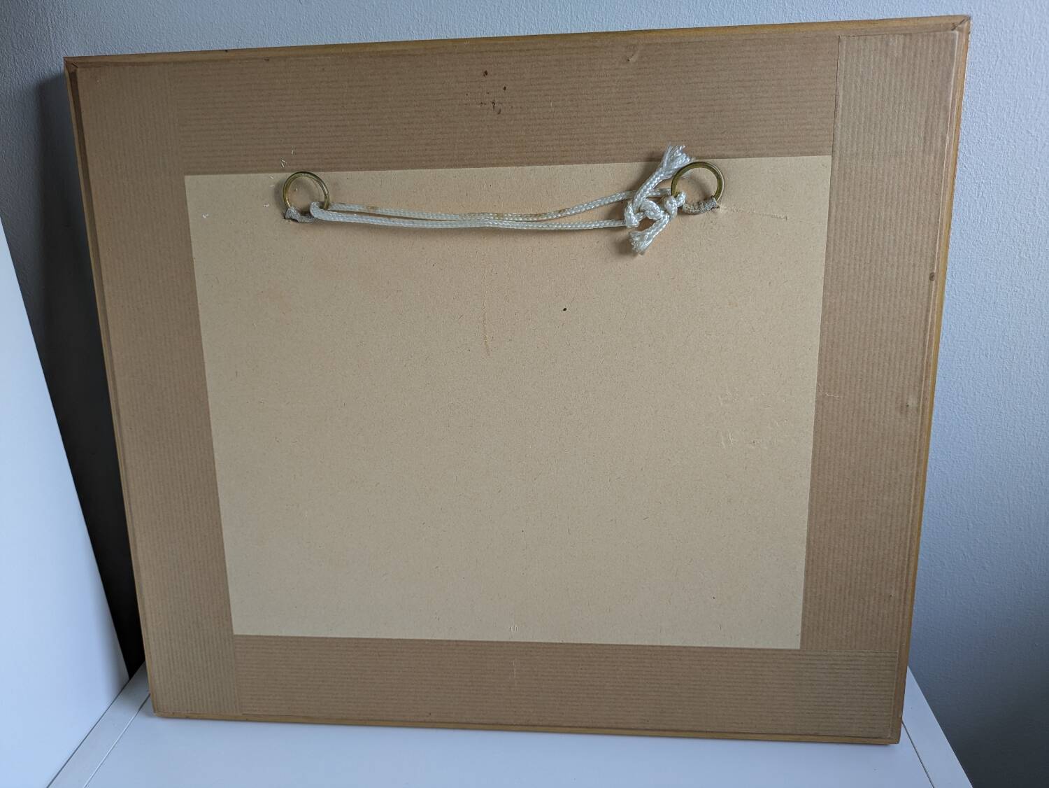 Watercolour signed 1949 framed with a magnifying glass.