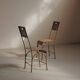 Paire de chaises en acier et tôle rivetée, vers 1920