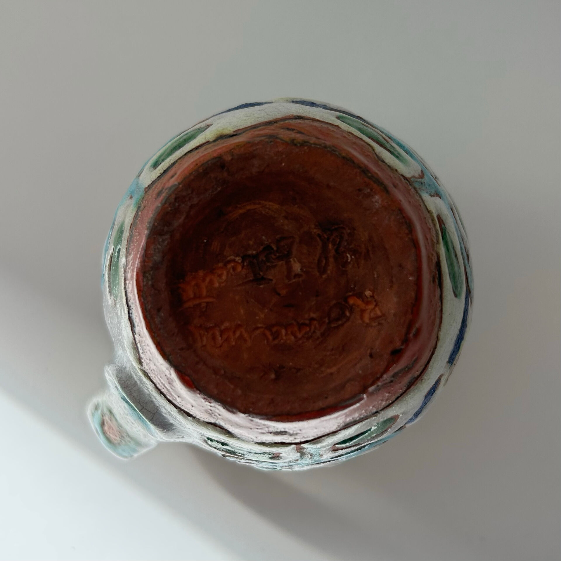 Small floral jug signed