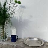 Round silver-plated metal serving dish with hallmark