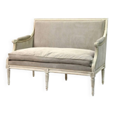 Louis XVI style canapé, in white lacquered wood.
