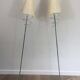 Pair of designer parquet floor lamps composed of lacquered metal and chrome bases and designer white plastic lampshades