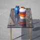 Smoked glass coffee table with adjustable brass legs, end of sofa, 70s table