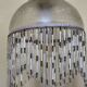 Retro brass lamp with a glass shade and bead fringes.