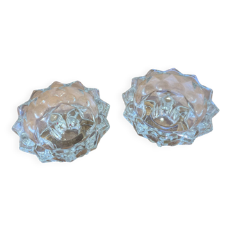 Low candle holder in chiseled glass