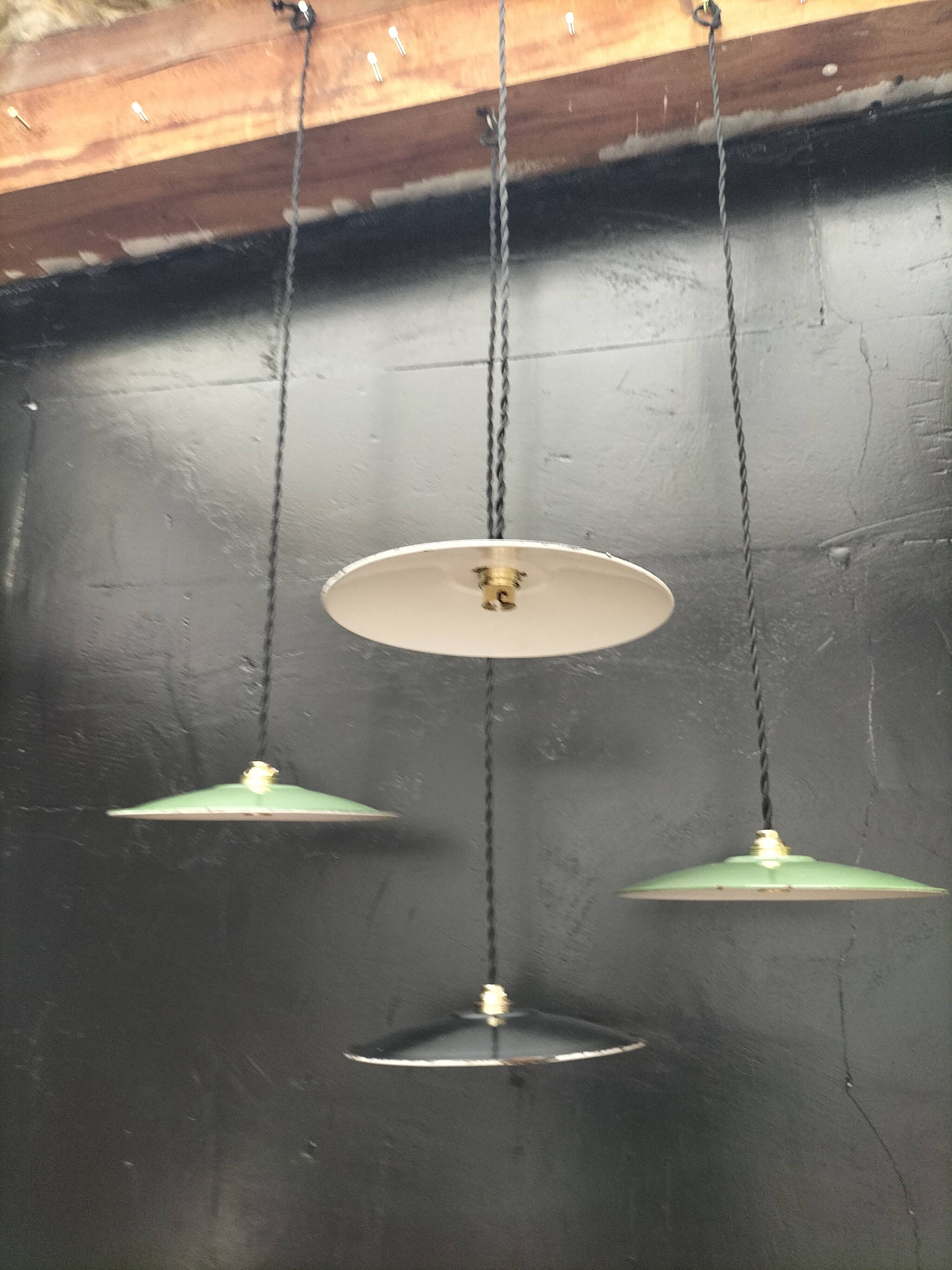 4 enameled sheet metal pendants