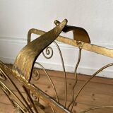 Vintage wrought iron magazine rack with gold butterfly design