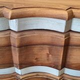 Walnut crossbow chest of drawers