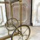 Rolling bar cart in brass and bronze circa 1960